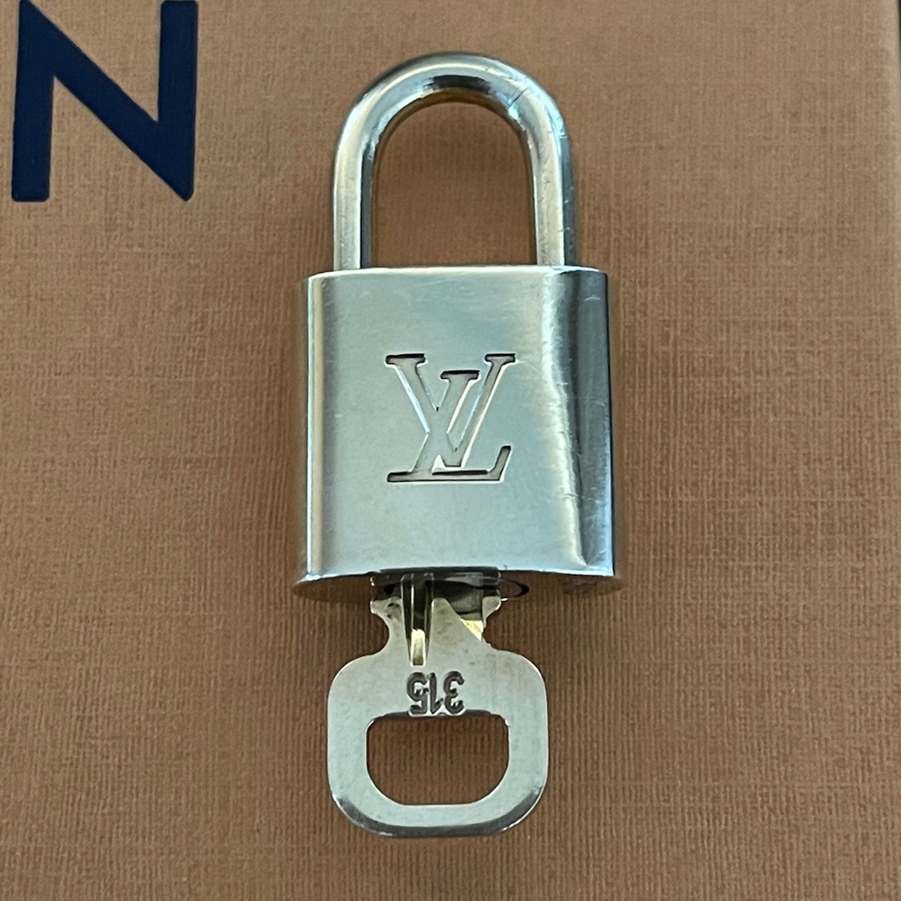 Louis Vuitton Gold Tone Cadena Lock and Key Set #315 for Speedy Alma Bag Lv